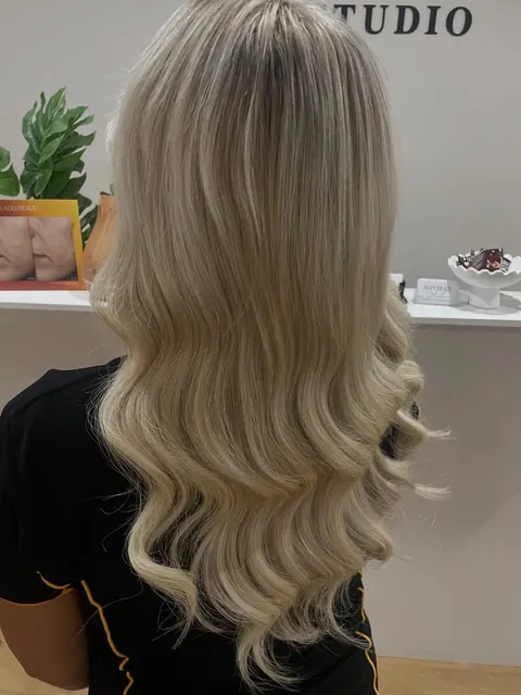 Smooth, icy, clean blonde waves at Republiq. Studio